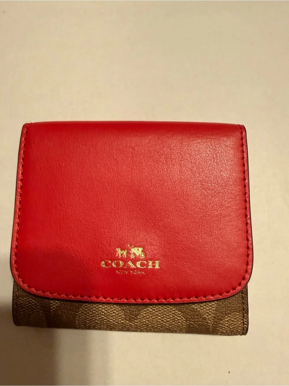 Coach Trifold Wallet in pink and Brown